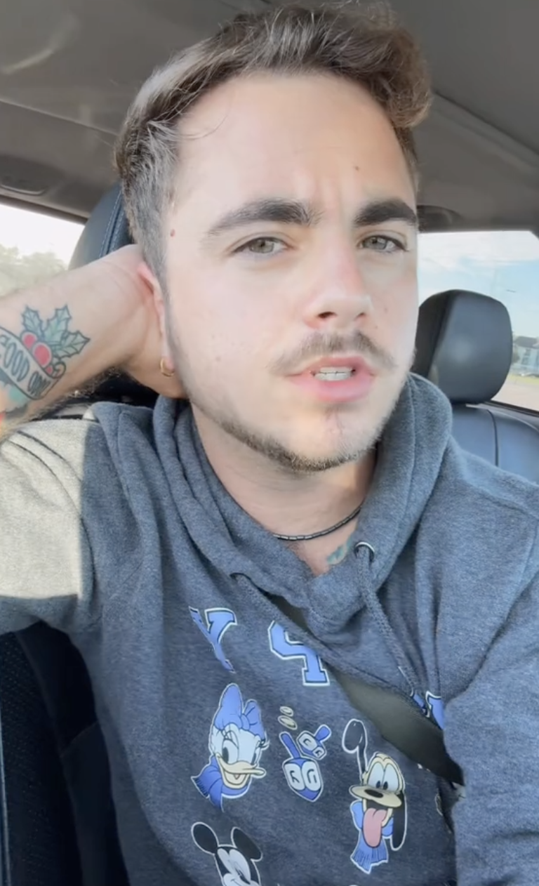 man talking to tiktok viewers